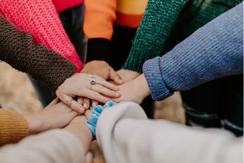 Hands together showing unity